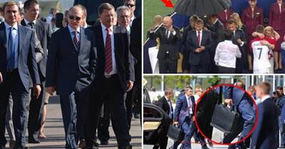普丁的保鏢不帶武器帶把傘？是普丁怕曬怕雨，還是這傘另有機關？